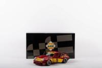 PORSCHE 934 RSR: An Exoto Racing Legends 1:18 highly detailed 1977 Porsche 934 RSR in Momo livery - 4
