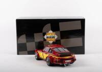 PORSCHE 934 RSR: An Exoto Racing Legends 1:18 highly detailed 1977 Porsche 934 RSR in Momo livery - 2