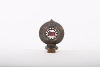 R.A.C.V.: A Royal Automobile Club of Victoria car grille badge fixed to bracket, has member number 13447&nbsp;stamped into the base, c1930s - 1940s, 10 cm diameter - 2