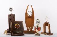 TROPHIES: A group of five assorted trophies