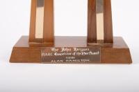 TROPHIES: A group of five assorted trophies - 10