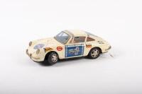PORSCHE 911: A circa 1970s tin plate Porsche 911 mechanical model, made by T.R.S of Japan
