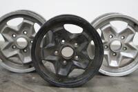 PORSCHE 944: Three circa 1974 Porsche 944 (or 911) 15IN x 6IN 'cookie cutter' alloy wheels, [P/N 91138102300], all wheels have some marks - 2