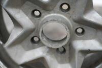 PORSCHE 944: Three circa 1974 Porsche 944 (or 911) 15IN x 6IN 'cookie cutter' alloy wheels, [P/N 91138102300], all wheels have some marks - 9
