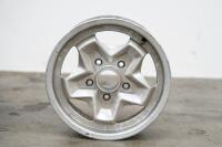 PORSCHE 944: Three circa 1974 Porsche 944 (or 911) 15IN x 6IN 'cookie cutter' alloy wheels, [P/N 91138102300], all wheels have some marks - 11