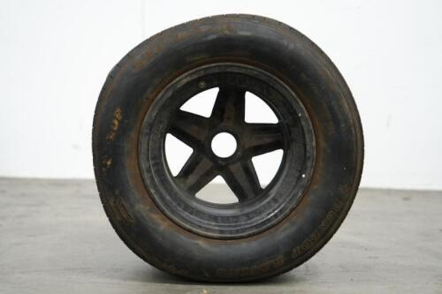 RACING WHEEL: A rear racing wheel with tyre, believed to have suited either a Porsche 908 or 917, 35cm wide