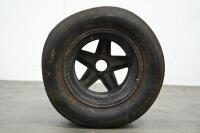 RACING WHEEL: A rear racing wheel with tyre, believed to have suited either a Porsche 908 or 917, 35cm wide