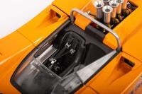McLAREN: A GMP 1:18 scale&nbsp;McLaren M8A model,&nbsp;as raced by Denny Hulme, orange, racing number #5 - 5
