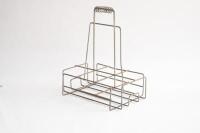 BOTTLE RACK: An original six bottle wire rack as suited for oil bottles - 6