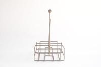 BOTTLE RACK: An original six bottle wire rack as suited for oil bottles - 8