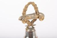 TROPHIES: Three trophies, all not inscribed, all have wreath and racing car finials with round bakelite bases - 2