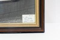 ALFREDO COSTANZO: Two large framed & glazed photographs of Alfred Costanzo driving a Tiga, one colour & one black & white, with largest photo including a personal message and signature from Alfredo to Alan Hamilton dated 1982 - 3