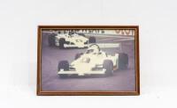ALFREDO COSTANZO: Two large framed & glazed photographs of Alfred Costanzo driving a Tiga, one colour & one black & white, with largest photo including a personal message and signature from Alfredo to Alan Hamilton dated 1982 - 4