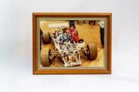 ALAN HAMILTON: Four framed & glazed photographs of different sizes of Alan Hamilton driving a racing car with exposed chassis - 3