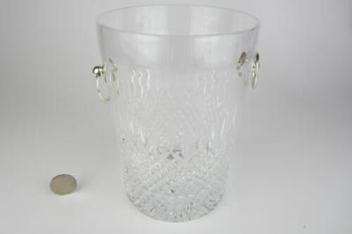 ICE BUCKET: A very finely cut twin-handled crystal ice bucket