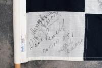 CHEQUERED FLAG: An important race used signed chequered flag from the 1976 Australian Grand Prix & ATC Hang Ten 400 race held at Sandown, signatures include Peter & Phil Brock, Colin Bond, Peter Janson, Jack Brabham, Kevin Bartlett, John Goss (winner), Jo - 10