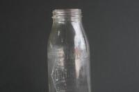 GOLDEN FLEECE: An original embossed Golden Fleece 'Hex Logo' one imperial quart glass oil bottle - 6
