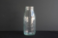 CALTEX: An original embossed Caltex one quart glass oil bottle&nbsp;