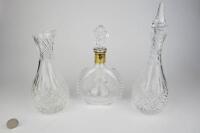 CRYSTAL: Three crystal and glass decanters