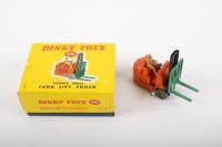 DINKY TOYS: A mid 1950s Dinky Toys No.401 Coventry Climax Fork Lift Truck in orange with green forks, within original box