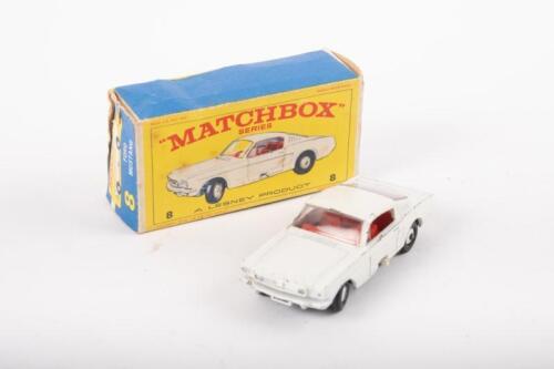 VINTAGE MATCHBOX: A vintage Matchbox series model car, number 8 Ford Mustang, white with red interior