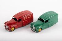 DINKY TOYS: Two Dinky Toys Austin delivery vans in restored condition, one green with yellow hubs, the other red with yellow hubs and 'BP Oil' livery to side