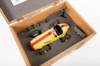 SHUCO: A reproduction Shuco tin toy wind up #1070 Grand Prix Racer model in yellow & red No.24, model within wooden presentation box with tools, key and stand - 2