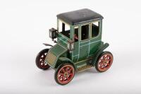 MODERN TOYS: A lithograph tin toy by Modern Toys Japan, lever driven, 13.5cm long