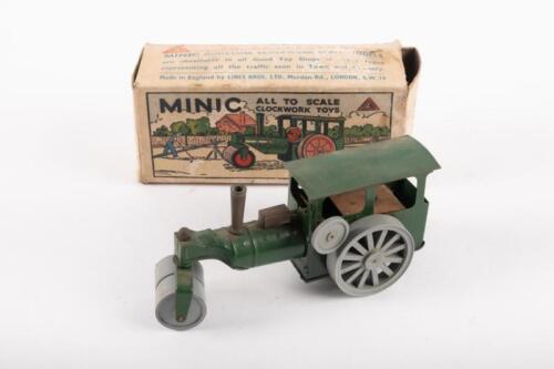MINIC: An early clockwork tin Tri-ang Minic model of a Steam Roller in green with grey plastic wheels, within original box