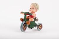 TRICYCLE: A interesting Japanese tin toy wind up&nbsp;tricycle with soft plastic boy figure&nbsp;