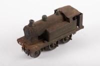 LOCOMOTIVE: A small tin&nbsp;model possibly clockwork of a 'L & NER' locomotive, 9cm long.