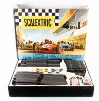 SCALEXTRIC: A c1960s Scalextric No.80 '4 In 1' racing track set, within box, comprising two F.1. Porsches and two B.R.M. open wheel racers