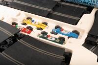 SCALEXTRIC: A c1960s Scalextric No.80 '4 In 1' racing track set, within box, comprising two F.1. Porsches and two B.R.M. open wheel racers - 2