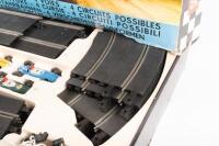 SCALEXTRIC: A c1960s Scalextric No.80 '4 In 1' racing track set, within box, comprising two F.1. Porsches and two B.R.M. open wheel racers - 3