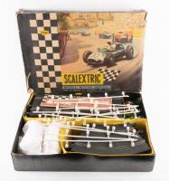 SCALEXTRIC: A c1960s Scalextric&nbsp;set '50', within original box, comprising four cars, including Scalextric C72 B.R.M, C73. F.1. Porsche, and two Mini Coopers believed to be by Airfix [Extra Photos added]