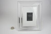 A heavy Waterford Crystal photo frame