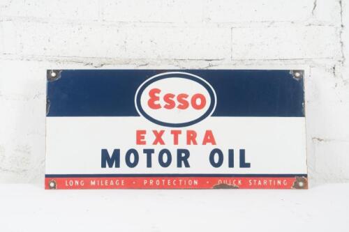 ESSO: An original enamel Esso 'Extra Motor Oil' ten bottle rack sign, 27cm high, 58cm wide