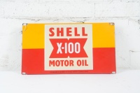 SHELL: A superb original Shell X-100 Motor Oil enamel ten bottle oil rack sign 27cm high, 48cm wide