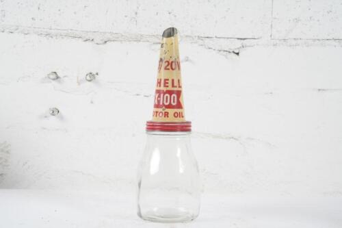 SHELL: An original one imperial pint glass oil bottle with original Shell X-100 '20/20 Motor Oil' tin top