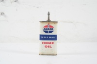 AMOCO: An Amaco&nbsp;'Home Oil' three fluid ounce lead top oiler