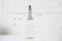 NEPTUNE: An original glass one quart oil bottle with Neptune '20W' motor oil tin top pourer
