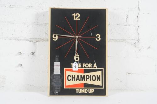 CHAMPION: A c1960s-1970s Champion Spark Plugs 'Time for a Tune-Up' plastic wall clock, some marks to face, 46cm high, 30.5cm wide