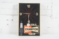 CHAMPION: A c1960s-1970s Champion Spark Plugs 'Time for a Tune-Up' plastic wall clock, some marks to face, 46cm high, 30.5cm wide