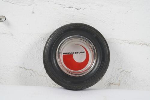 BRIDGESTONE: A c1960s-1970s Bridgestone advertising ashtray with glass centre and rubber Bridgestone tyre surround, cm diameter