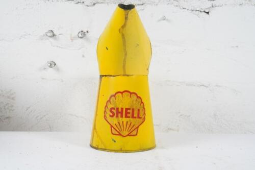 SHELL: A one quart oil jug with Shell logo