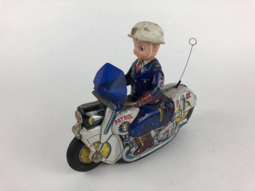 POLICE: Police Patrol made in Japan c1950s, friction, 21cms.