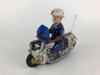 POLICE: Police Patrol made in Japan c1950s, friction, 21cms.