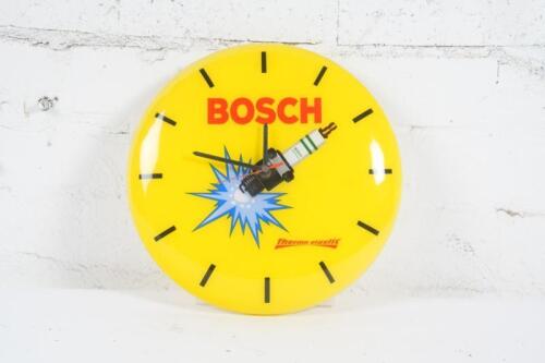BOSCH: A c1960s-1970s plastic Bosch 'Thermo Elastic' spark plugs workshop clock. Presents in excellent condition, 30cm high, 30cm wide