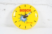 BOSCH: A c1960s-1970s plastic Bosch 'Thermo Elastic' spark plugs workshop clock. Presents in excellent condition, 30cm high, 30cm wide