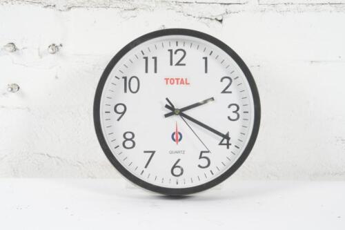 TOTAL: A quartz wall clock with Total advertising, likely c1980s-1990s, 24.5cm high, 24.5cm wide